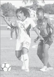  ??  ?? Scenes from the Guyana and Barbados clash at the National Track and Field Centre, Leonora in the CONCACAF Girls U17 Qualifying Championsh­ip (Orlando Charles photo)