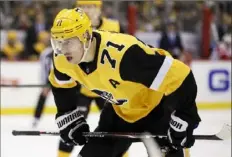  ?? Associated Press ?? Among Penguins, only Mario Lemieux and Lowell McDonald have won the Bill Masterton Memorial Trophy. Could Evgeni Malkin be the third?