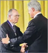  ?? Pablo Martinez Monsivais AP ?? STATE’S FIRST LATINO JUSTICE Cruz Reynoso receives the Presidenti­al Medal of Freedom from President Clinton in 2000.