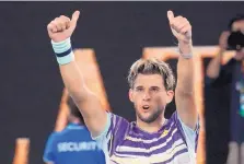  ?? LEE JIN-MAN/ASSOCIATED PRESS ?? Austria’s Dominic Thiem celebrates after beating Germany’s Alexander Zverev in their semifinal match on Friday.