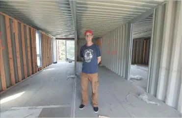  ?? CATHIE COWARD THE HAMILTON SPECTATOR ?? Geoffrey Young, in his unfinished shipping container house, estimates the total cost will be $500,000 or more.