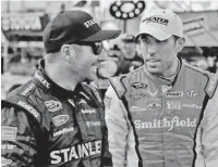  ?? AP ?? RPM teammates Aric Almirola (right) and Marcos Ambrose, shown last season, finished in the top five at Bristol on Sunday.