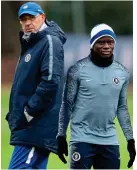  ??  ?? Cold shoulder: Sarri (left) with Kante at training yesterday League. We can’t look at City. They are a step ahead.’ Sarri will rest Eden Hazard against PAOK Salonika tonight after he suffered an ankle injury against Spurs but the Belgian will face Fulham on Sunday.