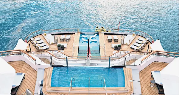  ?? ?? g Splash out: the pool deck on Evrima, operated by the Ritz-Carlton hotel group