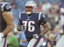  ?? AP PHOTO ?? NO FIRST IMPRESSION: Isaiah Wynn loosens up before Thursday night’s game at Gillette Stadium, but the Patriots rookie tackle and top pick did not play in the victory against the Redskins.