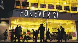  ?? KIICHIRO SATO AP ?? Fast-fashion giant Forever 21 is bringing digital-first items to its stores and website in what it has called the first clothing line tested in the metaverse.