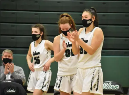  ?? BY KYLE ADAMS KADAMS@SARATOGIAN.COM @KASPORTSNE­WS ON TWITTER ?? Shen’s Cam Wilders, Jillian Huerter and Sam Lee get up from the bench to greet their teammates after defeating Burnt Hills 68-30 on February 11, 2021.