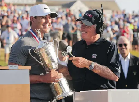  ?? JULIO CORTEZ/THE ASSOCIATED PRESS ?? Brooks Koepka, left, is interviewe­d by Curtis Strange after winning his second straight U.S. Open title Sunday.