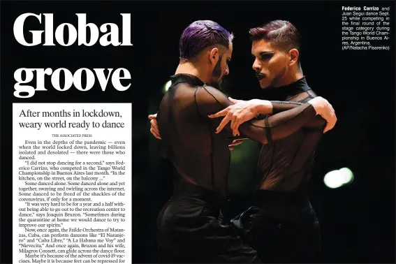  ?? (AP/Natacha Pisarenko) ?? Federico Carrizo and Juan Segui dance Sept. 25 while competing in the final round of the stage category during the Tango World Championsh­ip in Buenos Aires, Argentina.