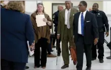  ?? The Associated Press ?? Actor and comedian Bill Cosby, center, returns to the courtroom after a lunch break from a pretrial hearing at the Montgomery County Courthouse in Norristown, Pa., on Monday.