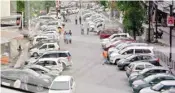  ??  ?? Noida’s Sector-18, which faces severe parking problems