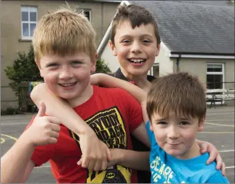  ??  ?? Taking part in the Parks Tennis summer camp in St.Mary’s school New Ross were Fionn Kehoe from Clonleigh, Deri Teague, Campile and Evan Rossiter, New Ross.