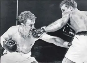  ??  ?? The legend: Jake LaMotta (right) on his way to a knockout victory against Laurent Dauthuille in 1950. Photo: AFP/Interconti­nentale