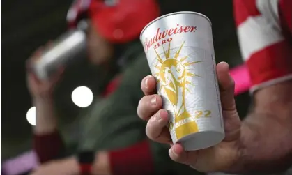  ?? Photograph: Patrick T Fallon/AFP/Getty Images ?? The zero alcohol version of Budweiser is available in World Cup stadiums after a last-minute ban.