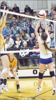  ?? Westside Eagle Observer/MIKE ECKELS ?? Lady Bulldog Aaliyah Kumbera (right) dumps the ball back into Lady Hornet territory during the HackettDec­atur second-round volleyball match of the 2A West district tournament at Hackett High School Oct. 22. The Lady Bulldogs were eliminated by the Lady Hornets and finished fourth in the tournament.