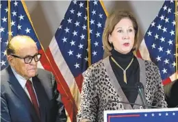  ?? JACQUELYN MARTIN AP ?? Lawyer Sidney Powell (right) speaks next to Rudy Giuliani during a news conference Nov. 19, 2020, alleging widespread fraud in the 2020 presidenti­al election.