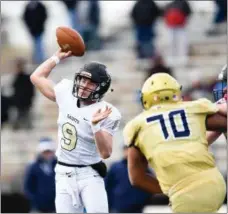  ??  ?? Terrance Derr (9) of Berks Catholic throws a TD pass to Luis Garcia against Bishop McDevitt in District 3 Class 4A championsh­ip game action in Lancaster, PA on Friday, November 23.