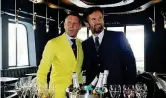  ??  ?? Lapo Elkann con Carlo Cracco (a destra) all’inaugurazi­one di Garage Italia, la società creata per personaliz­zare auto e mezzi di trasporto