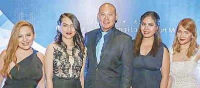  ??  ?? Belo Medical Group marketing and corporate communicat­ions team with DJ Tony Toni (center), Denise Bagtas, Apple Valenzuela, Hazel Salcedo, Patricia Verzosa