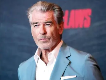 ?? CHRIS PIZZELLO/AP FILE ?? Pierce Brosnan got caught stepping off a trail in a thermal area at Yellowston­e National Park after posting pictures online, according to court records.