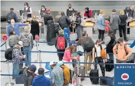  ?? AP ?? Airports were busy as Americans hurried to see family for Thanksgivi­ng.