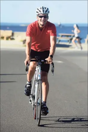  ?? Ned Gerard / Hearst Connecticu­t Media ?? U.S. Rep. Jim Himes departs Compo Beach Park, in Westport on Friday. Himes was joined by state legislator­s and community leaders Friday for the first leg of his bicycle tour north to the Massachuse­tts border.