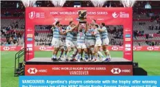  ?? ?? VANCOUVER: Argentina’s players celebrate with the trophy after winning the Vancouver leg of the HSBC World Rugby Sevens Series against Fiji on April 17, 2022. —AFP
