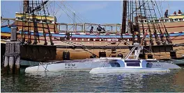  ?? AP Photo/Charles Krupa ?? ■ Mayflower Autonomous Ship floats next to the replica of the original Mayflower on Thursday in Plymouth, Mass. The crewless robotic boat retraced the 1620 sea voyage of the Mayflower.