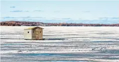  ?? GUS GARCIA SHUTTERSTO­CK ?? When you’re done skating, you can grab your rod and try your hand at ice fishing from inside any of the hundreds of huts on the lake.