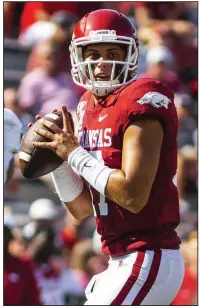  ?? Special to the NWA Democrat-Gazette/DAVID BEACH ?? Arkansas’ Nick Starkel looks for a receiver Saturday against Colorado State at Reynolds Razorback Stadium in Fayettevil­le. Starkel was 20-of-35 passing for 305 yards and 3 touchdowns, leading the Razorbacks to a 55-34 victory.