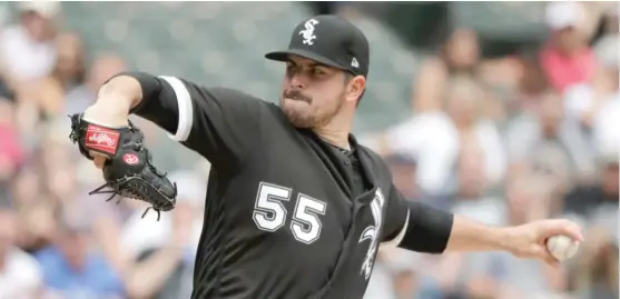  ?? CHARLES REX ARBOGAST/ AP ?? White Sox starting pitcher Carlos Rodon allowed two runs and two hits but was done after five innings because he had thrown 100 pitches.