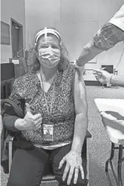  ?? SUBMITTED ?? Carla Durst, infection prevention­ist at New Glarus Home, a nursing home that received doses of the COVID-19 vaccine Monday, receives the vaccine.