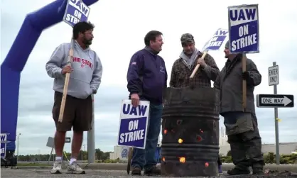  ??  ?? GM workers on strike in Lordstown, Ohio. The 40-day strike has now been settled. Photograph: Eleonore Sens/AFP via Getty Images