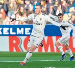  ?? AFP ?? Real Madrid’s Gareth Bale reacts after scoring against Huesca.