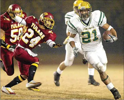  ?? CALIFORNIA­N FILE PHOTOS ?? ABOVE: West High junior Ryan Mathews gets past Tulare Union defenders, including Justin Baeza (58) and Randy Mendez (24), as he runs in for his team’s second touchdown during the 2005 Central Section Division II Championsh­ip game at Bob Mathias Stadium in Tulare. BELOW RIGHT: West’s Daron Mackey gets past East defenders, including Jan Wollitz, as he makes his way in for a touchdown during a 2005 game.