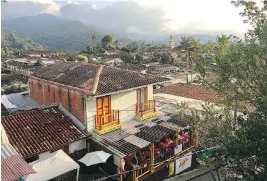  ?? TOM SHRODER/FOR THE WASHINGTON POST ?? One of Colombia’s hottest tourist destinatio­ns is Salento, seen at left and right. The picturesqu­e town features bars with live music, restaurant­s serving good food and backpacker­s from all over.