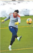  ??  ?? Goalkeeper Hope Solo kicks the ball during practice last week at the Colorado School of Mines as the Americans prepare for their friendly Sunday against China. John Leyba, The Denver Post