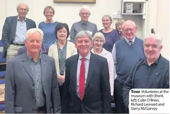  ??  ?? Tour Volunteers at the museum with (front, left) Colin O’Brien, Richard Leonard and Gerry McGarvey