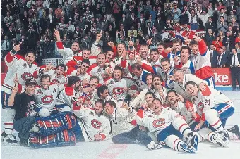  ?? BRUCE BENNETT GETTY IMAGES FILE PHOTO ?? The Montreal Canadiens pose after winning the Stanley Cup in 1993, their roster stacked with Quebec-born players. If anyone can revive Quebec’s hockey pulse, it’s François Legault, Rick Salutin writes.