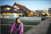  ??  ?? A longtime resident of Japantown, Nobuko Fujioka, 92, strolls around her neighborho­od in the evening in January, part of her daily routine.