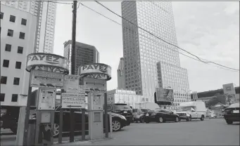  ?? ALLEN MCINNIS/ THE GAZETTE ?? Owners of downtown parking lots are suffering with the NHL season on hold.