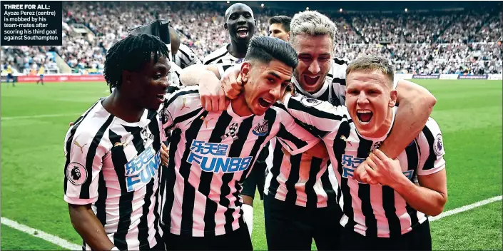  ??  ?? THREE FOR ALL: Ayoze Perez (centre) is mobbed by his team-mates after scoring his third goal against Southampto­n