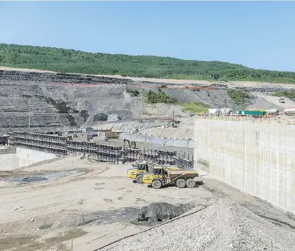  ?? B.C. HYDRO/FILES ?? Regarding tension cracks on the north bank of the Peace River site where B.C. Hydro’s Site C dam is being constructe­d, utility COO Chris O’Riley says “we’ve removed almost 11 million cubic metres of earth to lay back the slope and stabilize it.”