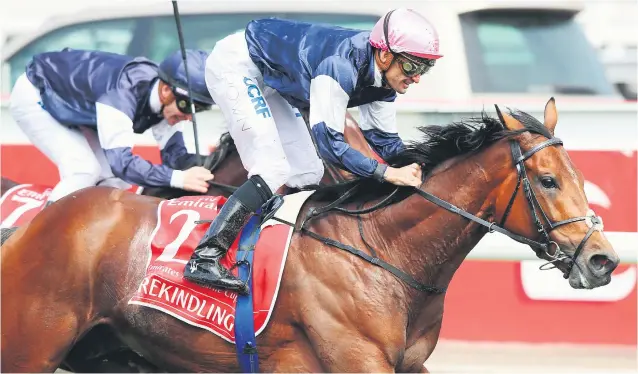  ?? Picture: Getty Images ?? GLORY RIDE.Corey Brown boots home Rekindling in the Emirates Melbourne Cup at Flemington Racecourse on November 7.