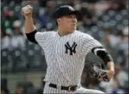  ?? JULIE JACOBSON — THE ASSOCIATED PRESS ?? New York Yankees pitcher Masahiro Tanaka delivers against the Toronto Blue Jays during the first inning of a baseball game, Friday in New York.