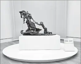  ?? Christophe­r Knight Los Angeles Times ?? “THE AGE of Maturity,” by Camille Claudel, is a three-figure allegory of aging.
