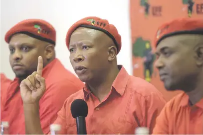  ?? Picture: Tracy Lee Stark ?? CHANGES AFOOT. Economic Freedom Fighters leader Julius Malema, centre, addresses the media at Nasrec yesterday ahead of the party’s December conference.