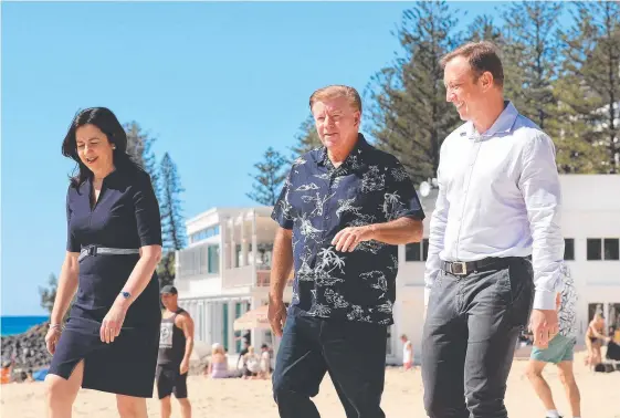  ?? Picture: SCOTT POWICK ?? Premier Annastacia Palaszczuk at Burleigh Heads Mowbray Park SLSC with Wayne ‘Rabbit’ Bartholome­w and Deputy Premier Steven Miles.