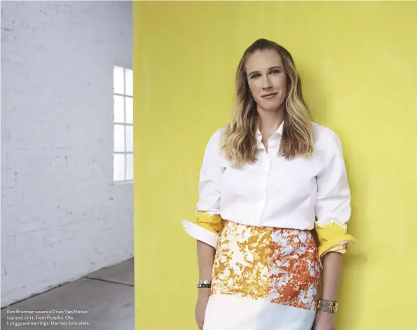  ??  ?? Kim Brennan wears a Dries Van Noten top and skirt, from Poepke. Ole Lynggaard earrings. Hermès bracelets.