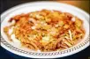  ??  ?? ■Smothered: sauteed with onions
